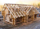 Slokana Log Homes  Dec/2009 :- Arial view showing complexity of roof rafters. This log home was constructed with 18" ( 47 cm ) midspan diameter Western Red Cedar Logs with the roof rafters  at 12" ( 30 cm ). We custom build to your requirements.